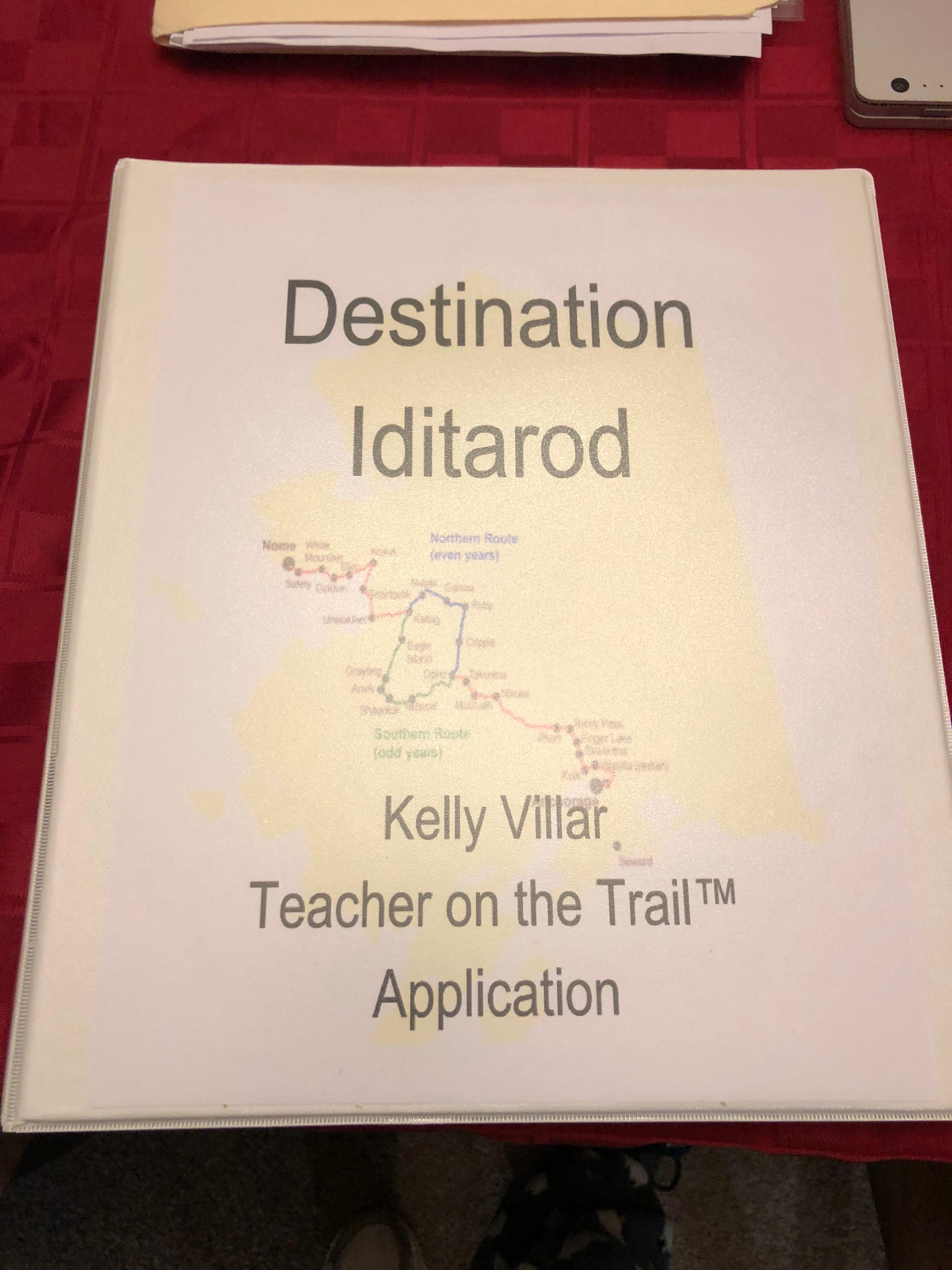 Kelly Villar's application in a binder